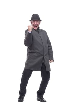 emotional man in a hat and autumn coat . isolated on a white background.