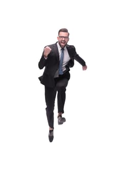 in full growth. happy dancing young businessman. isolated on white background