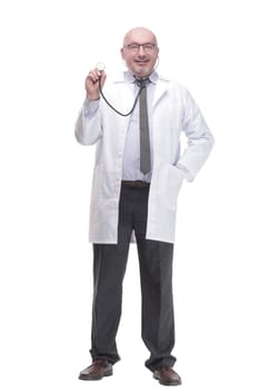 in full growth. qualified mature doctor with stethoscope.isolated on a white background.
