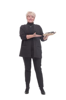 full-length. Mature business woman with a gift box. isolated on a white background.