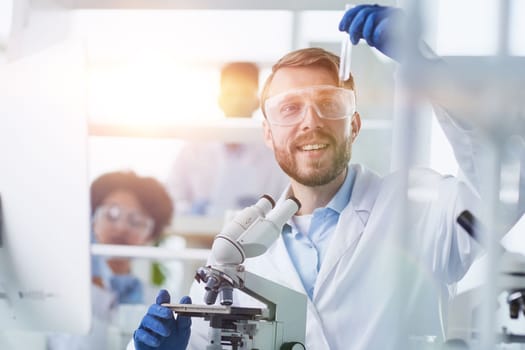 Focused male scientist working in laboratory