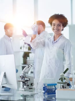 Scientists smiling together in lab