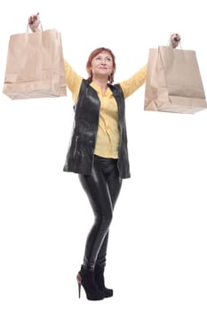 happy mature woman with shopping bags. isolated on a white background.