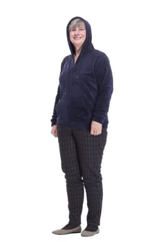 full-length. casual elderly woman in a comfortable autumn jacket looking at you . isolated on a white background.