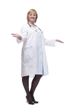 in full growth.friendly female doctor with a stethoscope. isolated on a white background.