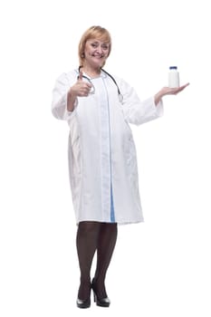 in full growth.friendly female doctor with sanitizer in hand. isolated on a white background.