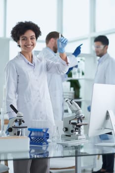 Scientists smiling together in lab