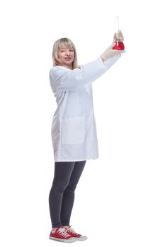 in full growth. medical woman with a laboratory flask . isolated on a white background.