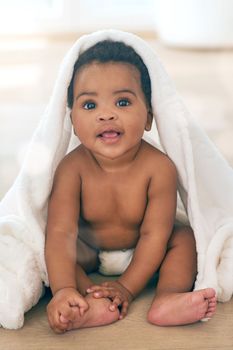 Some days I just cant decide what to wear...an adorable baby girl covered in a towel at home