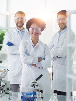 Scientists smiling together in lab