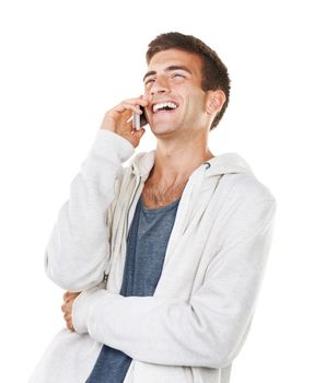 Communication through the wonders of technology. A casual laughing male talking on his cellphone