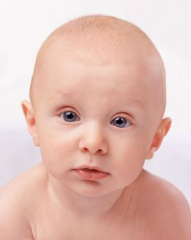 Hes his moms little angel. Studio shot of a cute little baby boy