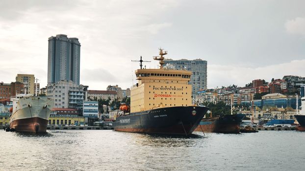 Cove with ships off the coast in the city of Vladivostok.