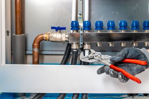 connecting the floor heating to the switchboard.