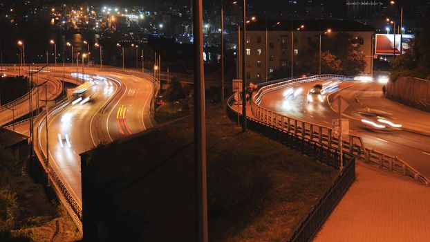 Car traffic at night in city Vladivostok
