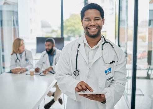 Portrait, black man and doctor with tablet, digital analysis and schedule surgery in hospital. African American male, medical professional and online research for cure, diagnosis and healthcare