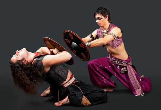 ritual scene with shield and spear - traditional arabia costume