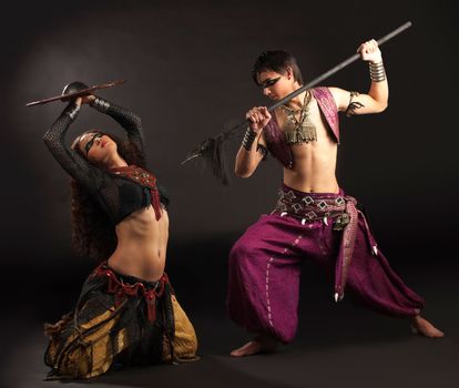 ritual scene with shield and spear - traditional arabia costume