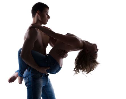 Sexy couple posing topless in jeans silhouette isolated