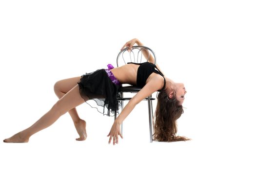 Beauty woman show sexy dance with chair isolated