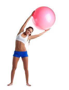 young woman stand with fitness ball isolated on white
