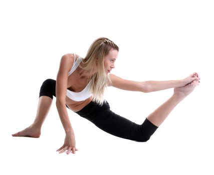 young woman in fitness costume doing split isolated