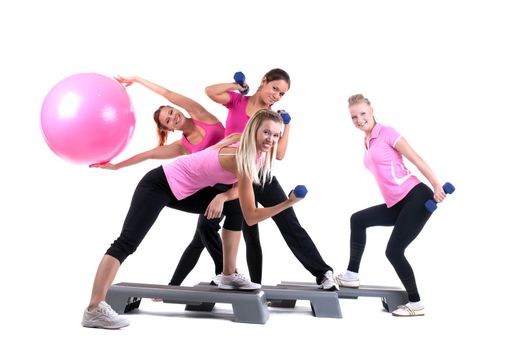 young group of fitness instructors with training accesories isolated