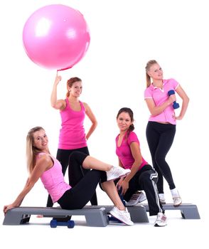 young group women fitness instructor on stepper with accessories isolated