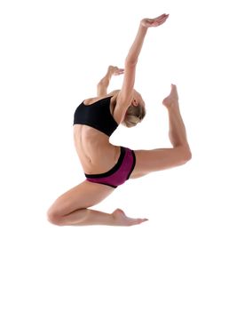 Blond woman doing jump in fitness cloth isolated