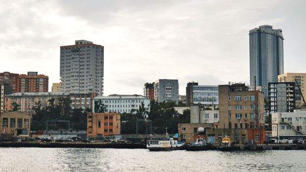 Panorama of the Russian city of Vladivstok. View from the moving ferry