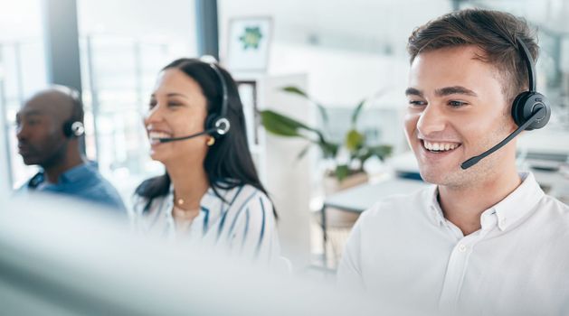 Call center, customer service and happy team for support, crm and telemarketing in office. Men and woman consultant at pc with a smile for sales target, contact us and online advice with teamwork.