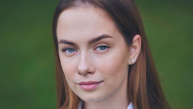 Portrait of an 18-year-old girl. Close-up of her face