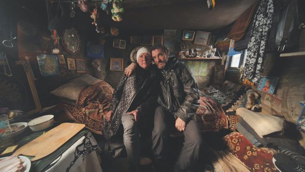A homeless couple tells a story in their cabin
