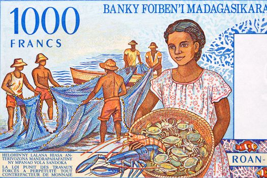 Woman with basket of shellfish and fisherman with net from Malagasy money