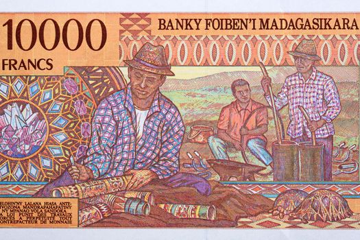 Artisans at work from Malagasy money - Ariary