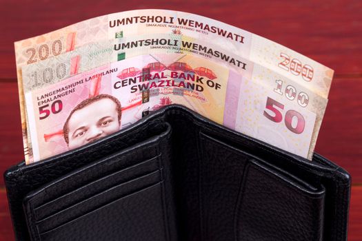 Swazi money - lilangeni in the black wallet