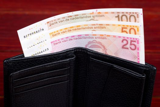 Netherlands Antillean money -  guilder in the black wallet