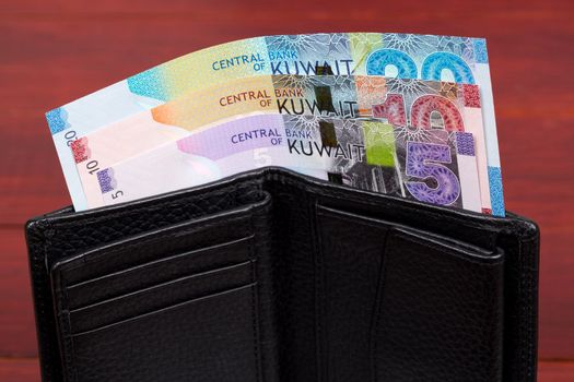 Kuwaiti money - Dinar in the black wallet