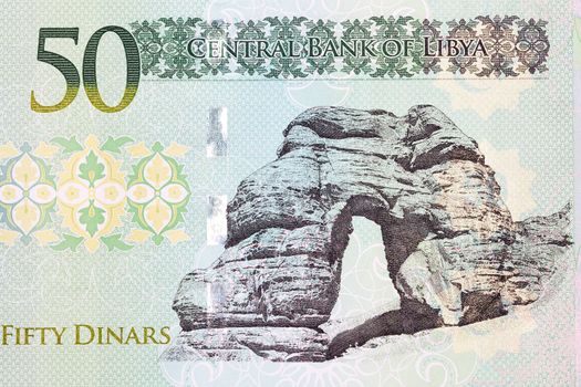 Stone arch in Tadrart Acacus from Libyan money - Dinars