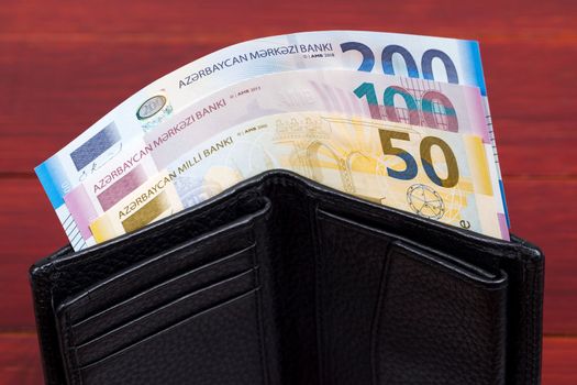 Currency of Azerbaijan - Manat in the black wallet