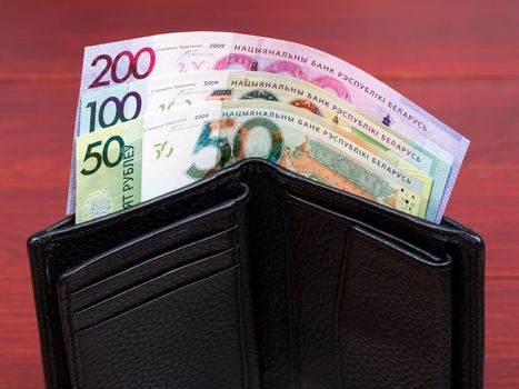 Belarusian money - ruble in the black wallet