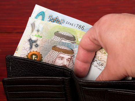 Bahraini money - dinar in the black wallet