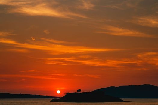 Red sunset on Mamula island. Montenegro. High quality photo