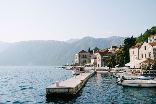 Moored boats at the pier. Perast. Montenegro. High quality photo