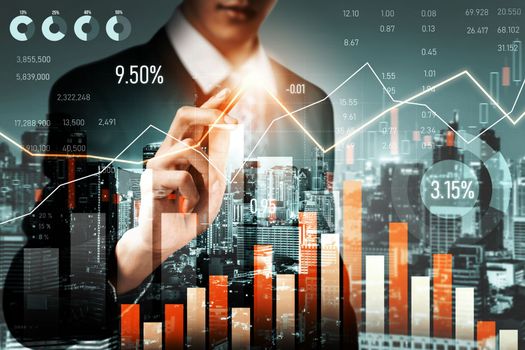 Businessman analyst working with digital finance business data graph showing technology of investment strategy for perceptive financial business decision. Digital economic analysis technology concept.