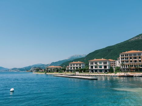 Hotel complex One and Only Portonovi at the foot of the mountains on the shore of the Bay of Kotor. High quality photo