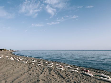 Boom dries on the sand by the blue sea. High quality photo