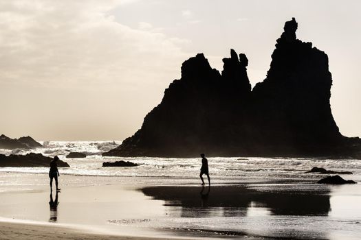 People on the sandy beach of Benijo on the island of Tenerife.Spain.