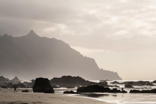 People on the sandy beach of Benijo on the island of Tenerife.Spain.