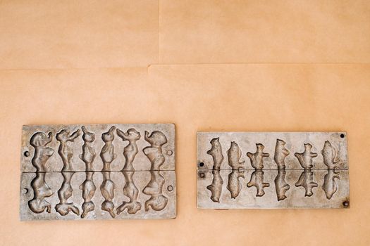 Forms for making sugar lollipops.A taste of our childhood.Rooster lollipops.Sugar caramel.
